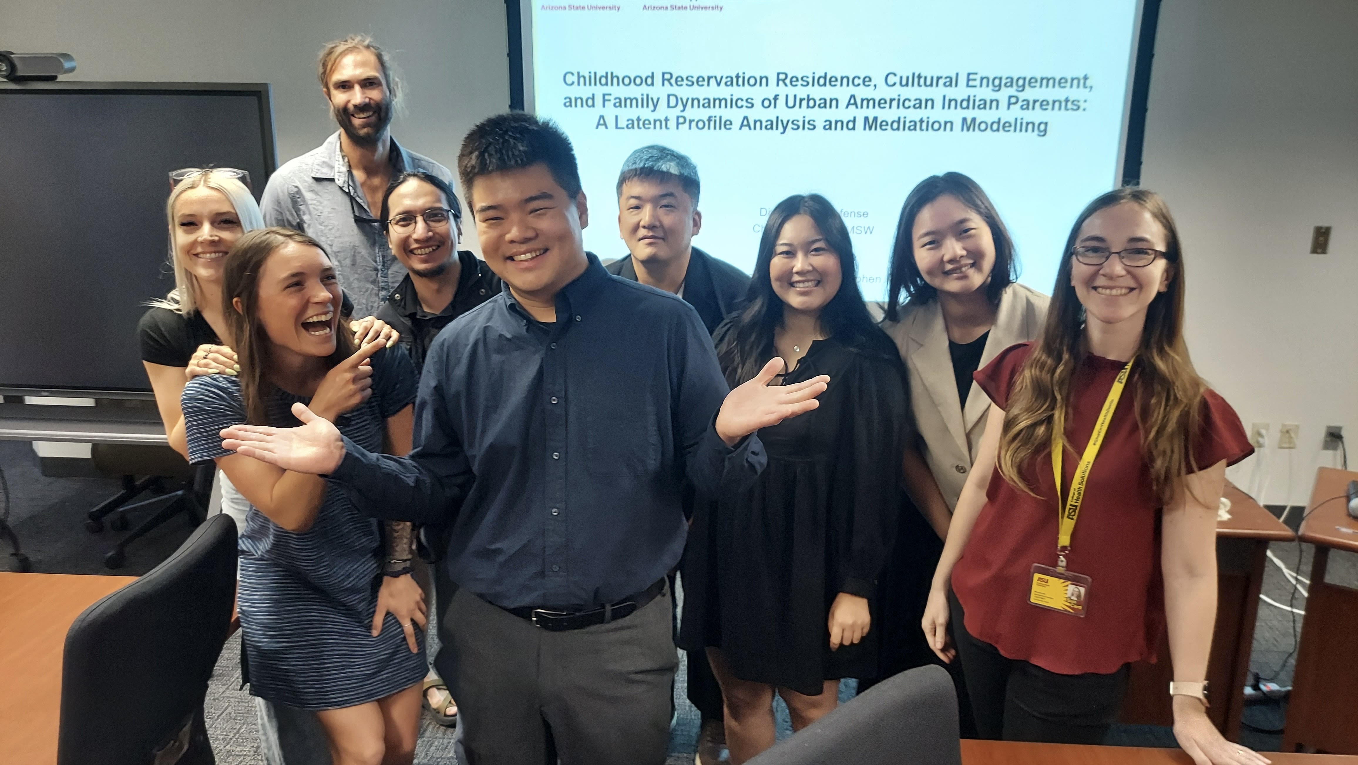 Chao-Kai Huang poses with his friends and coworkers from GCAHR on Friday, April 11, 2025 in the GCAHR office. (Stephen Kulis)